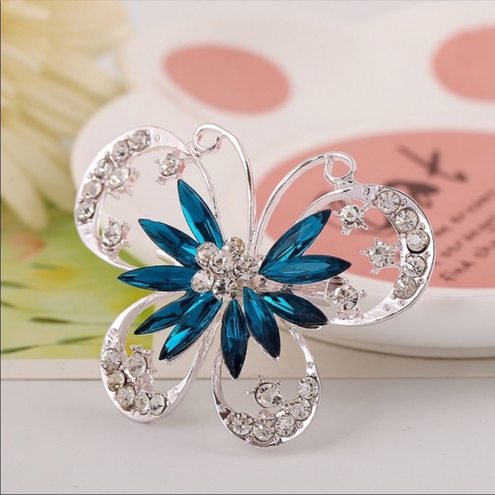 Women’s butterfly blue brooch